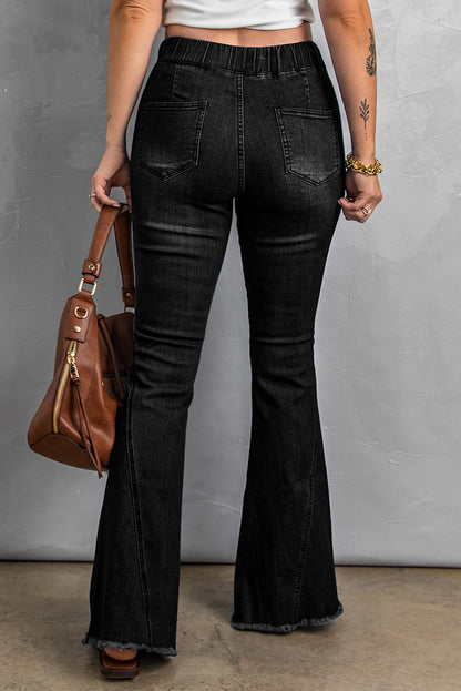 Pantalones de mezclilla con parte inferior de campana desgastada multicolor