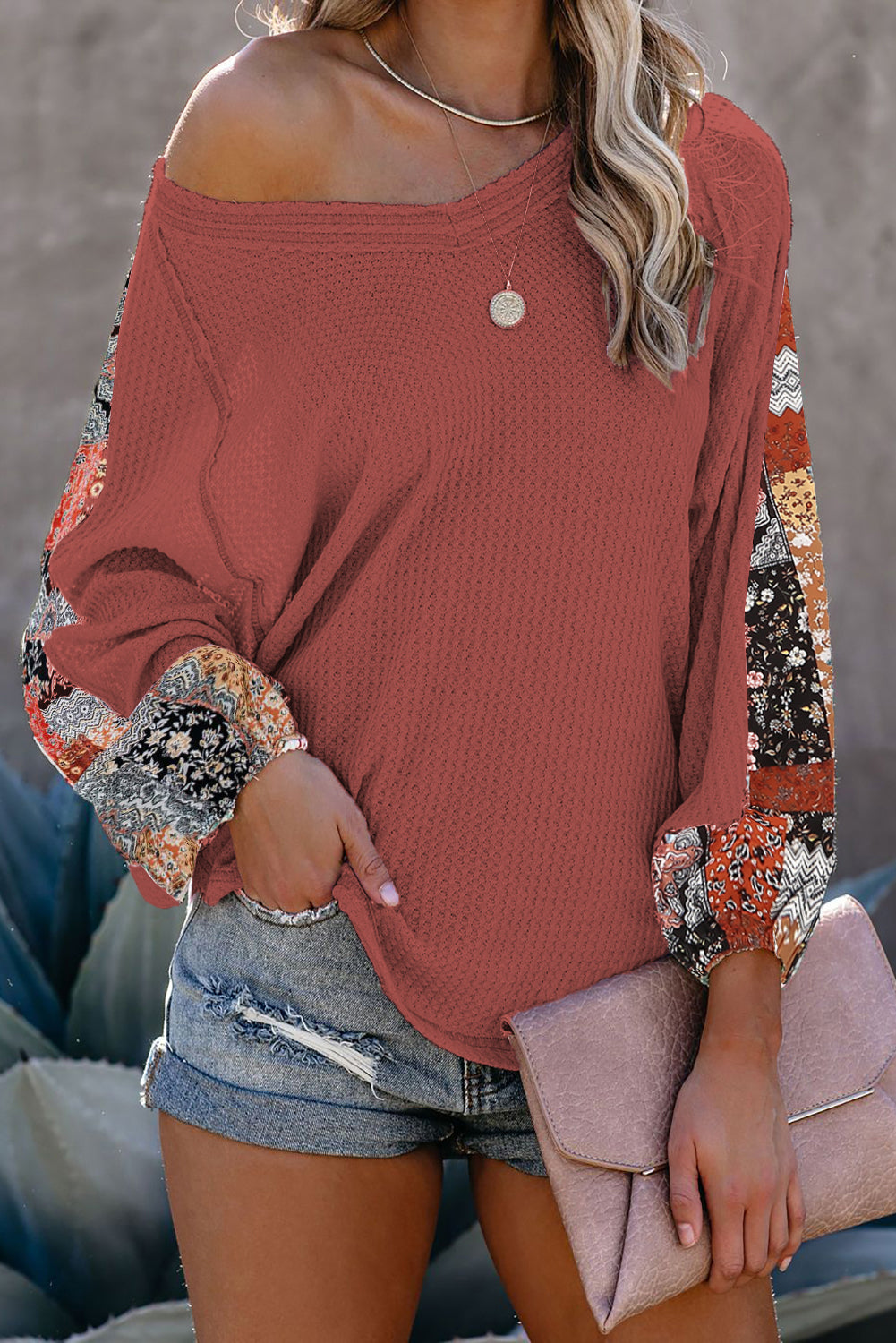 Blusa de punto gofrado con empalme de leopardo