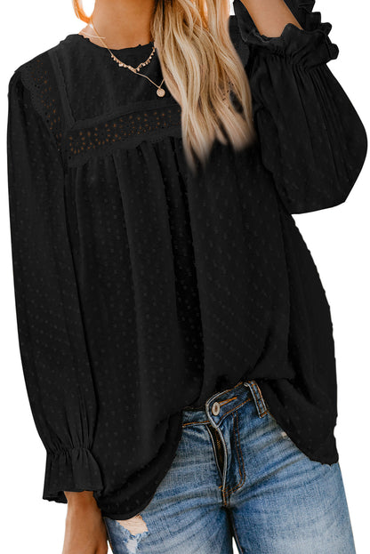 Blusa con mangas con volantes y lunares suizos