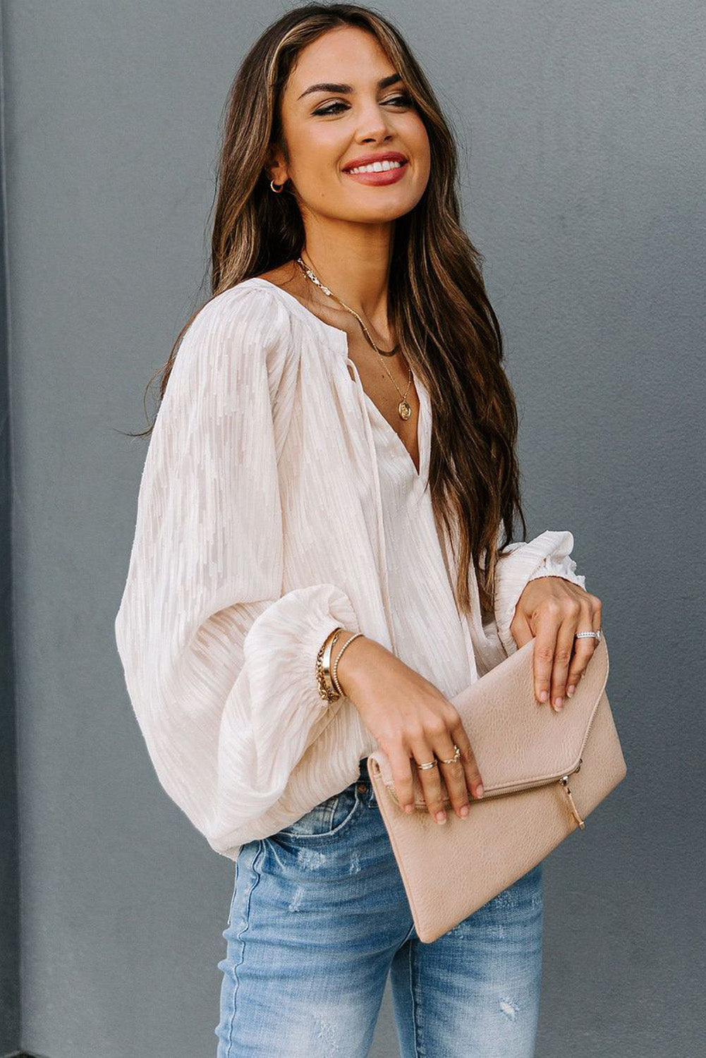 Haut uni texturé à col en V et manches lanternes 