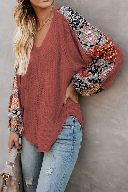 Blusa de punto gofrado con empalme de leopardo