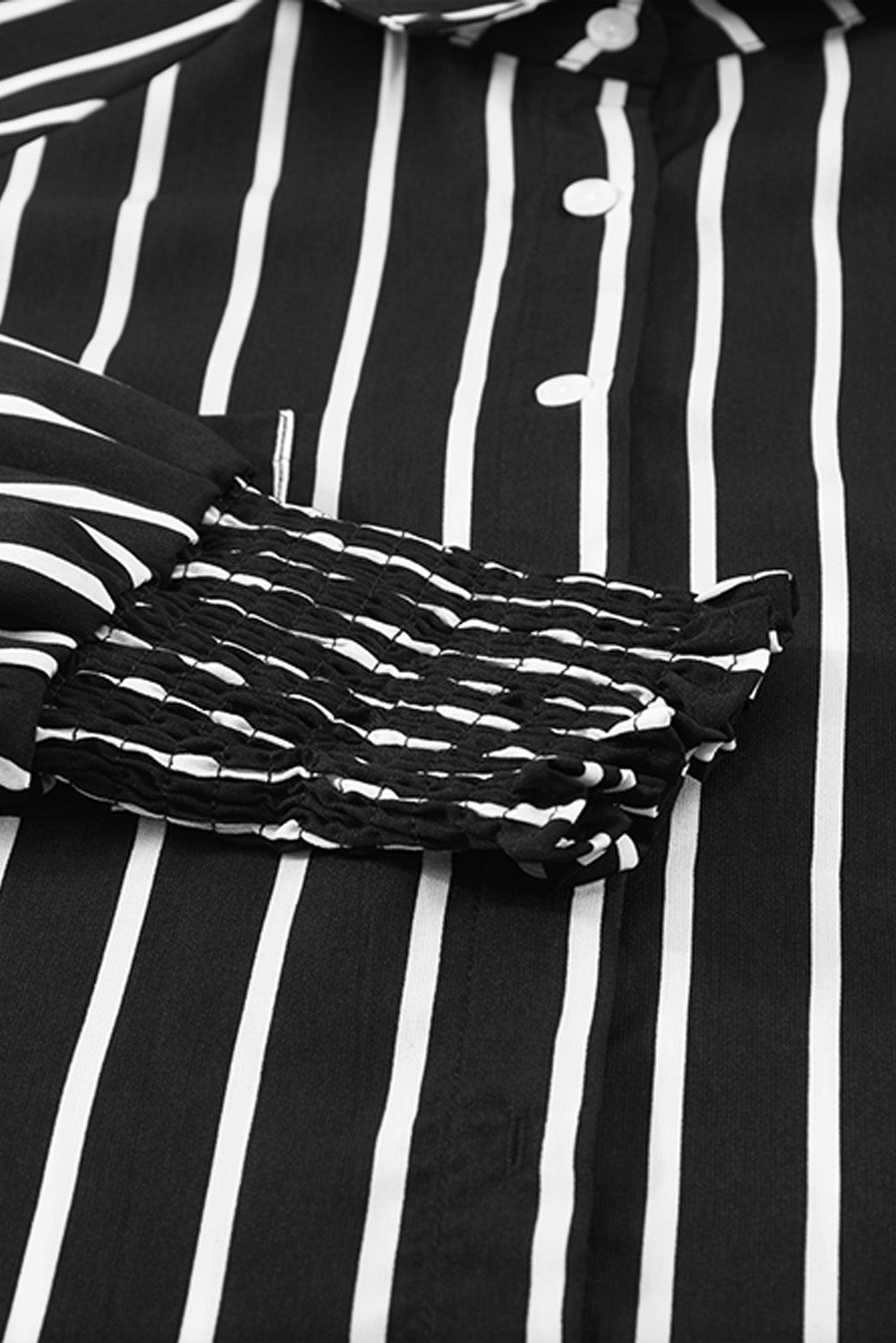 Chemise boutonnée rayée à poches et fentes 