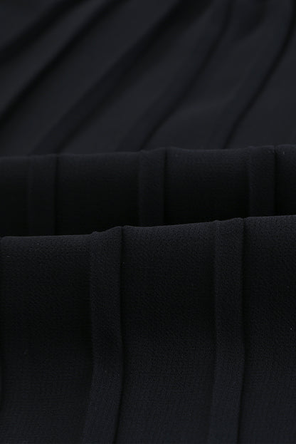 Mini-robe plissée en dentelle patchwork à manches lanternes