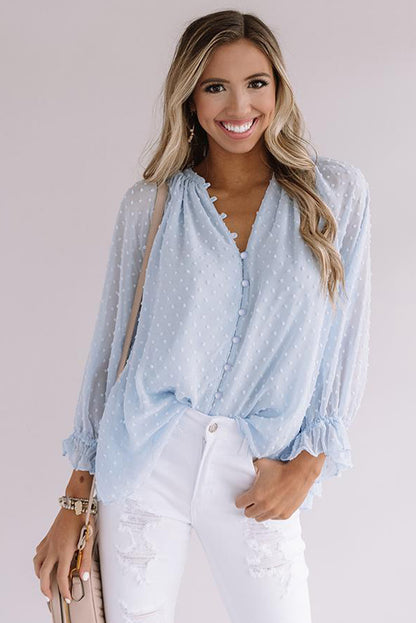 Chemise à pois suisses à boutons amples 