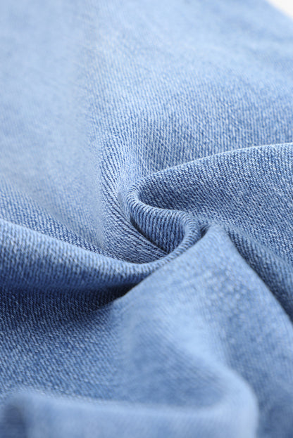 Jeans ajustados al tobillo desgastados con lavado medio