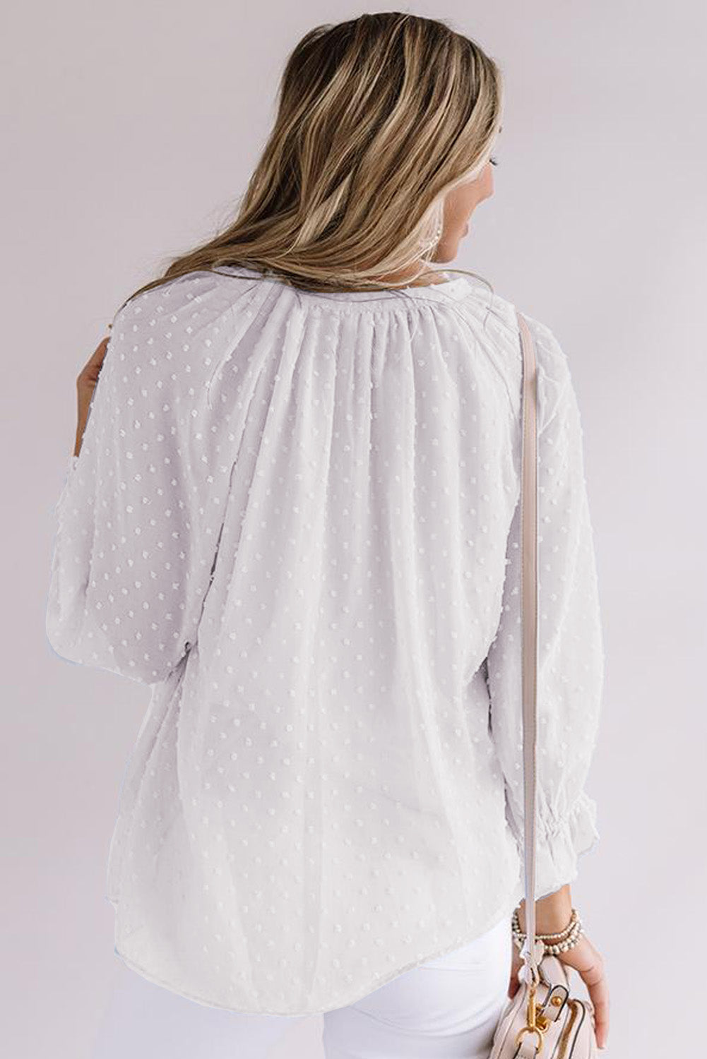 Chemise à pois suisses à boutons amples 