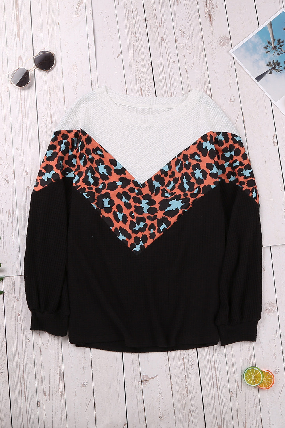 Top de punto con patchwork de leopardo colorblock