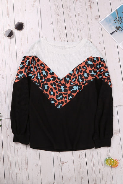 Top de punto con patchwork de leopardo colorblock