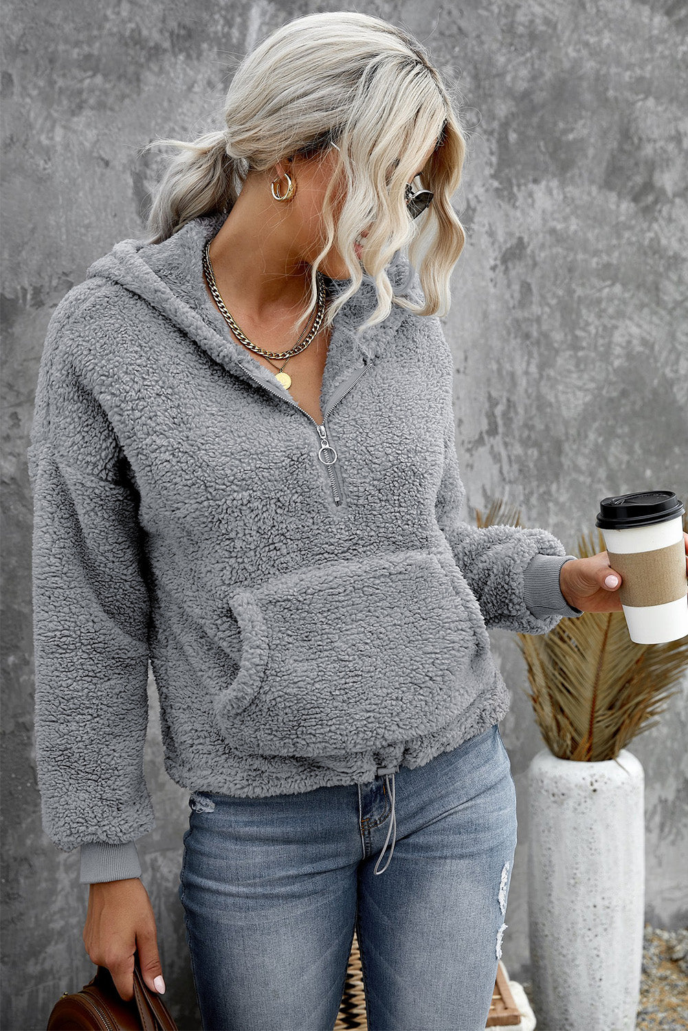 Sweat-shirt à capuche zippé 1/4 en sherpa avec kangourou