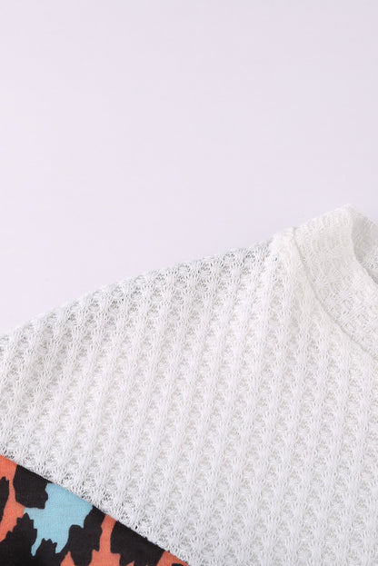 Top de punto con patchwork de leopardo colorblock
