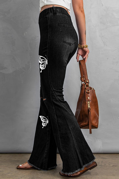 Pantalones de mezclilla con parte inferior de campana desgastada multicolor