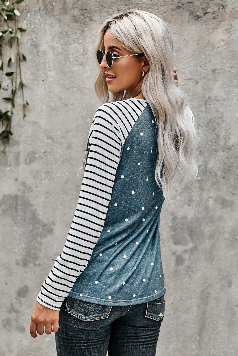 Top de manga a rayas con panel de leopardo negro con bolsillo de lentejuelas