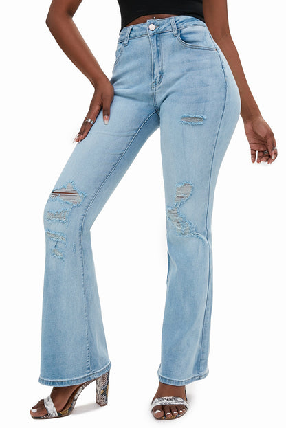 Jeans acampanados desgastados lavados