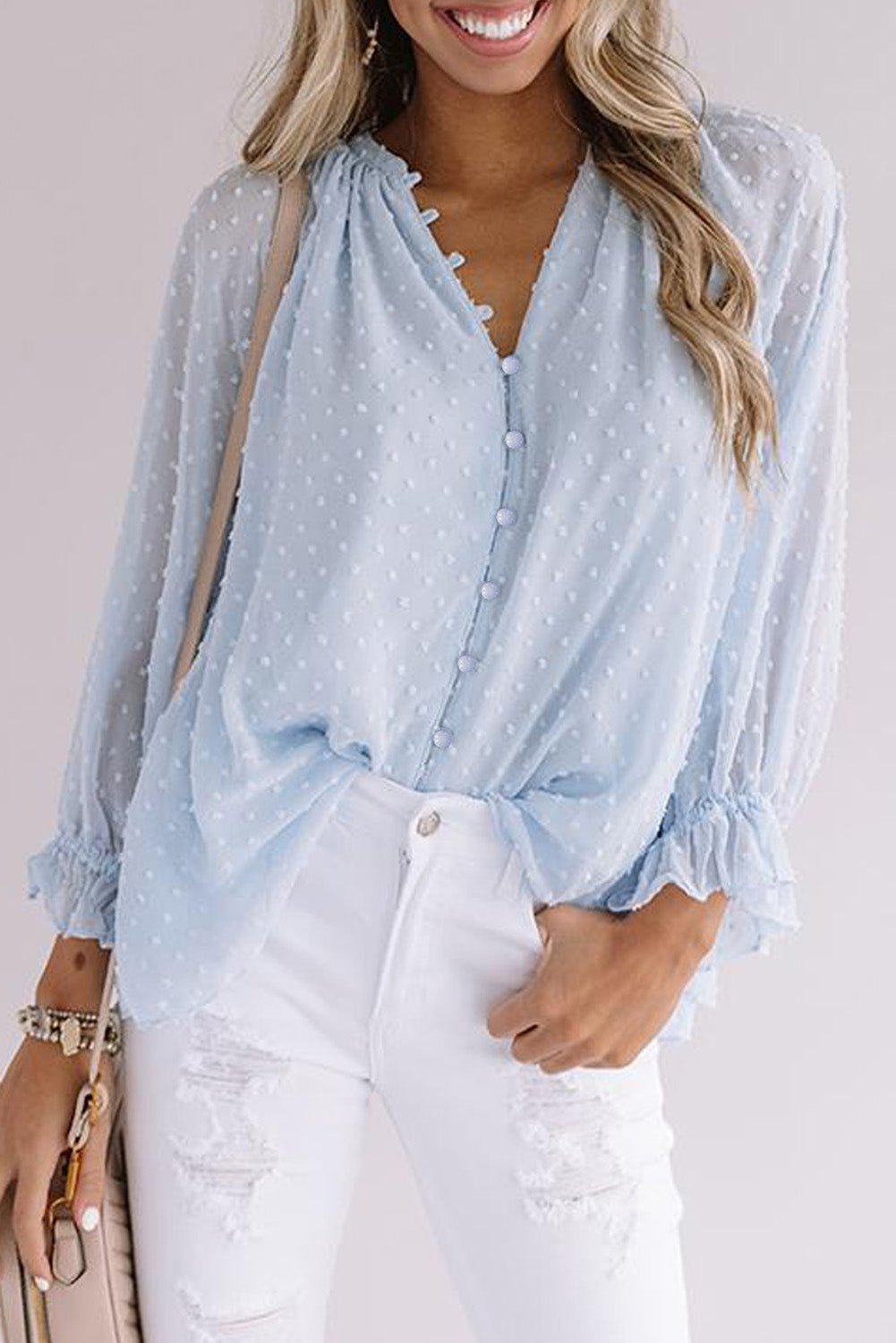 Chemise à pois suisses à boutons amples 