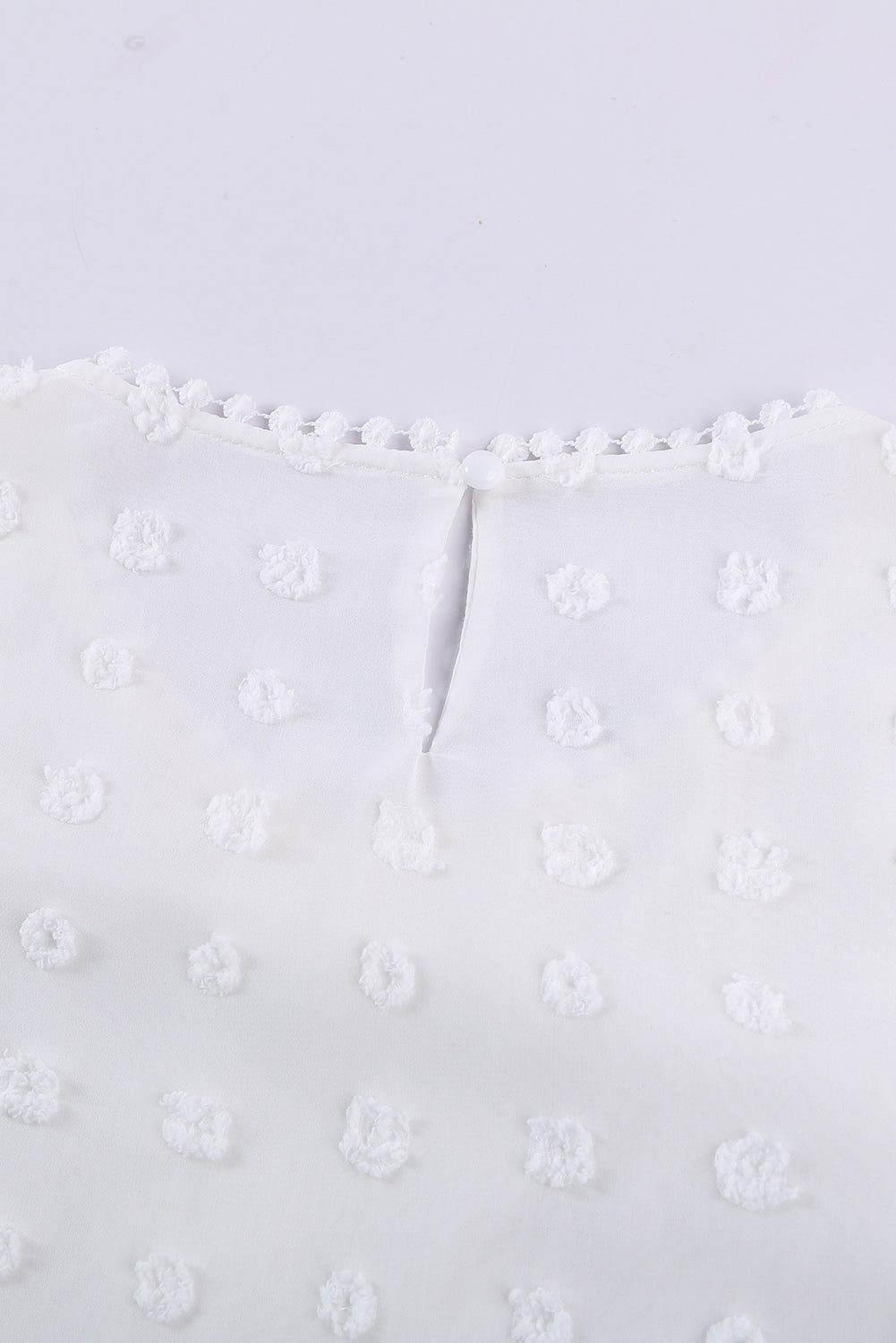 Blusa con manga farol y encaje de lunares