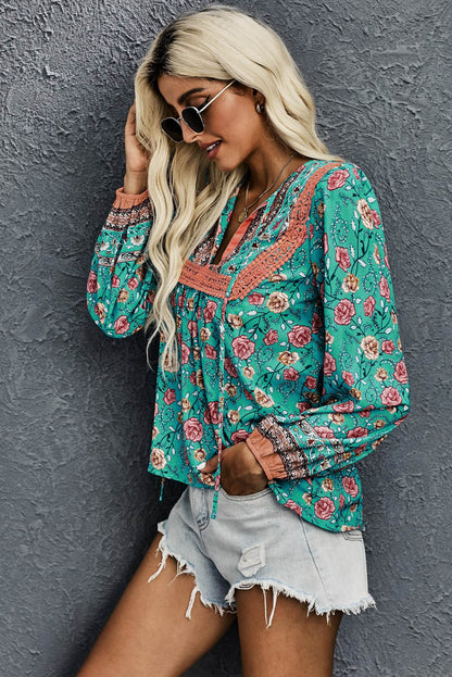 Chemisier fleuri à col en V et manches lanternes