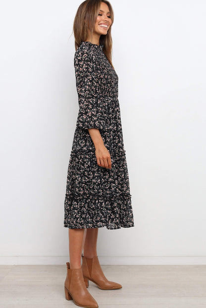 Robe fleurie à volants et manches lanternes 