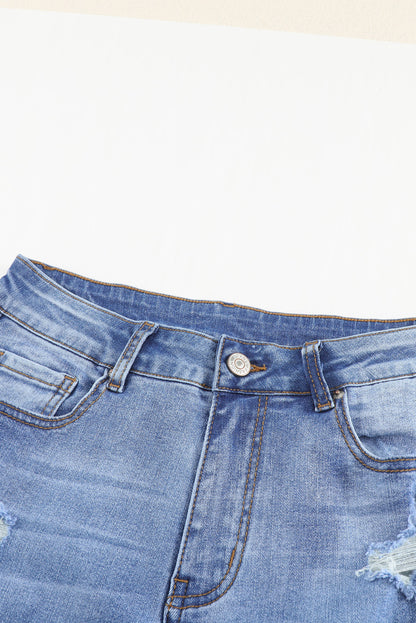 Jeans ajustados al tobillo desgastados con lavado medio