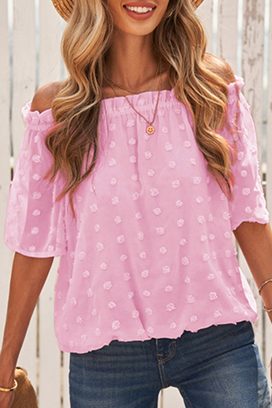 Blusa corta con hombros descubiertos y lunares suizos