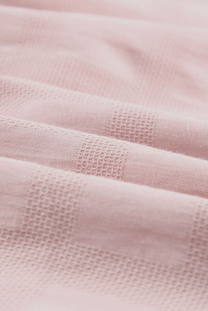 Haut à manches courtes et col carré en jacquard