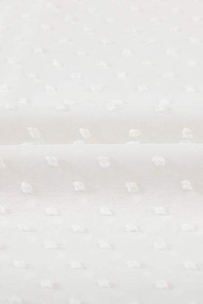 Camisa abotonada con volantes y lunares