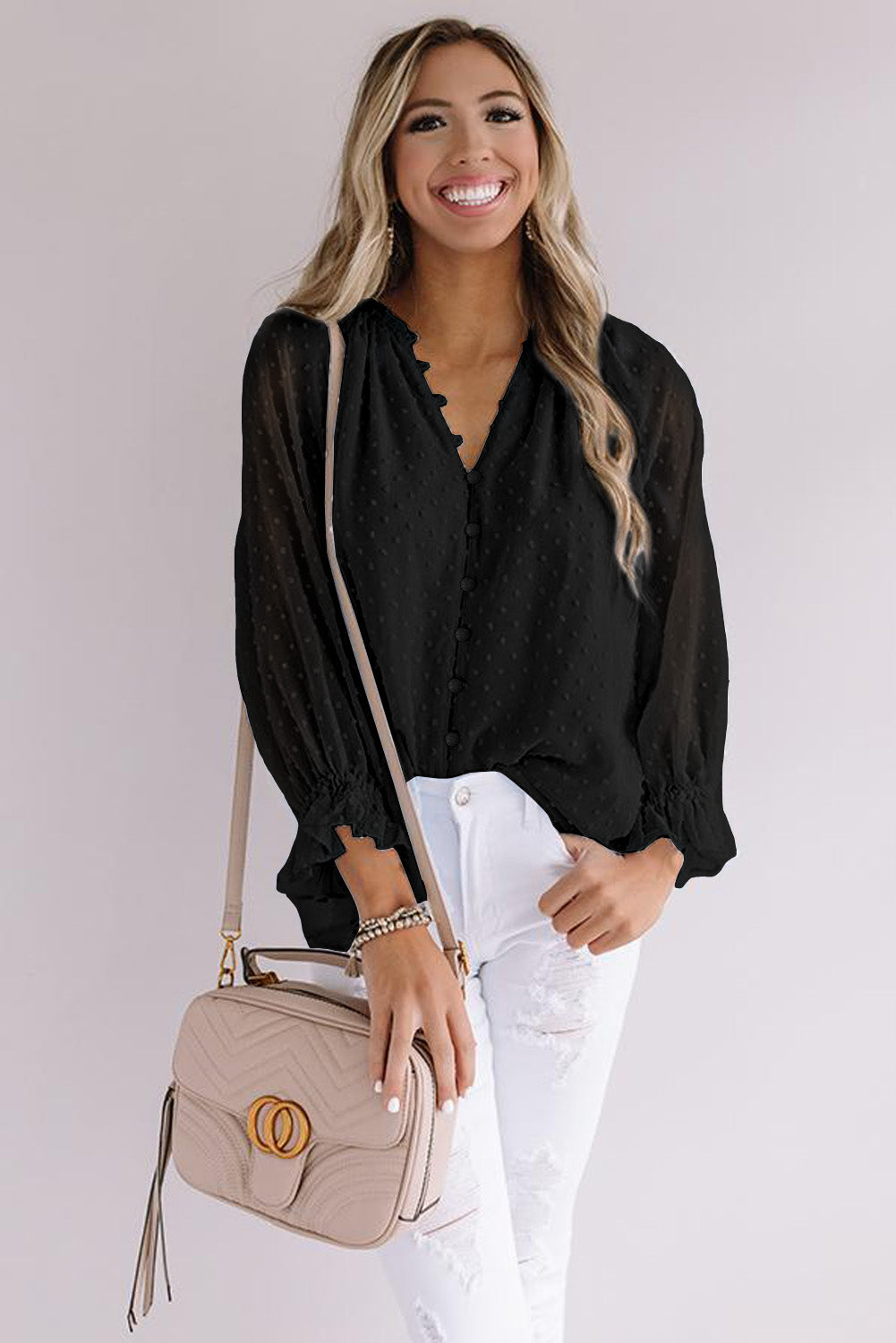 Chemise à pois suisses à boutons amples 