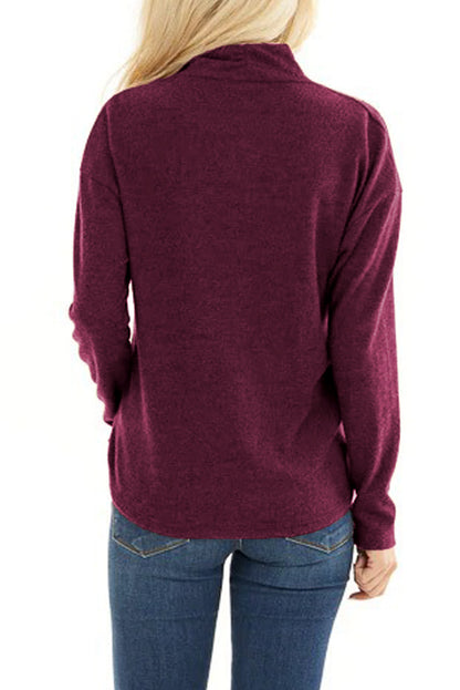 Haut à manches longues et col en V avec ourlet torsadé irrégulier