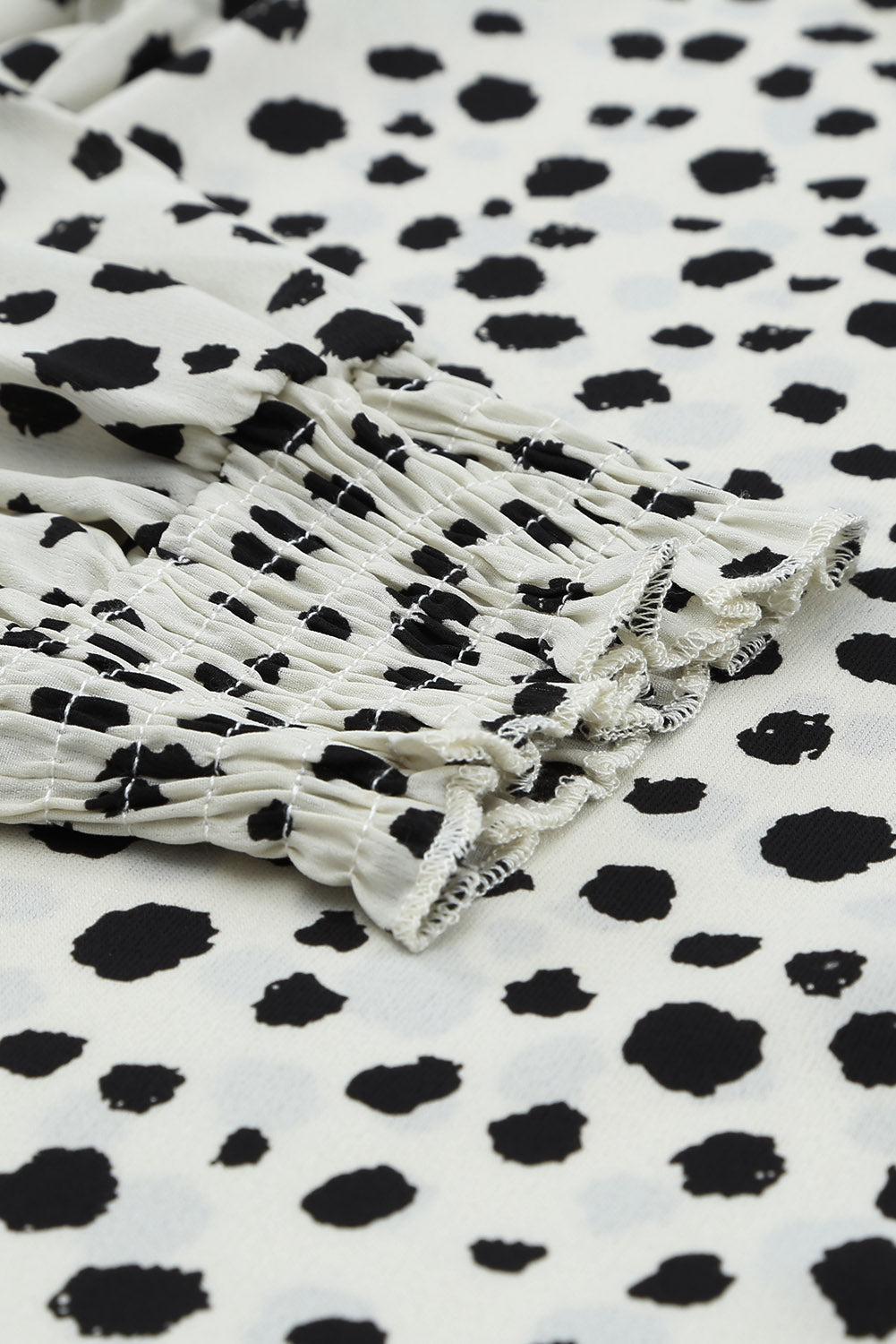 Blusa con manga farol y volantes de lunares