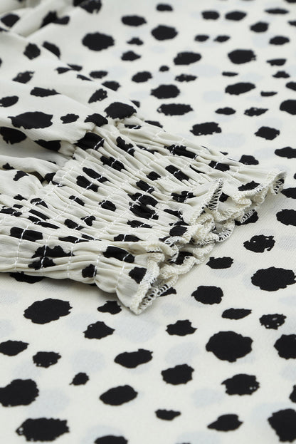 Blusa con manga farol y volantes de lunares