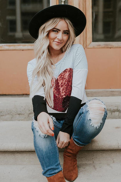 Haut rayé à manches longues et paillettes en forme de cœur