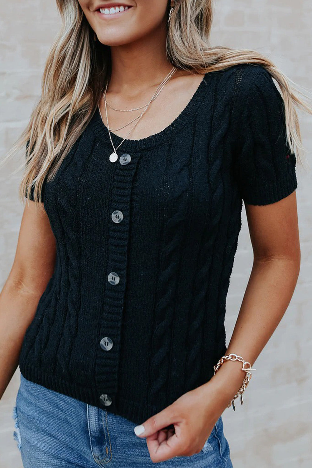 Top caqui de punto de ochos con botones y manga corta