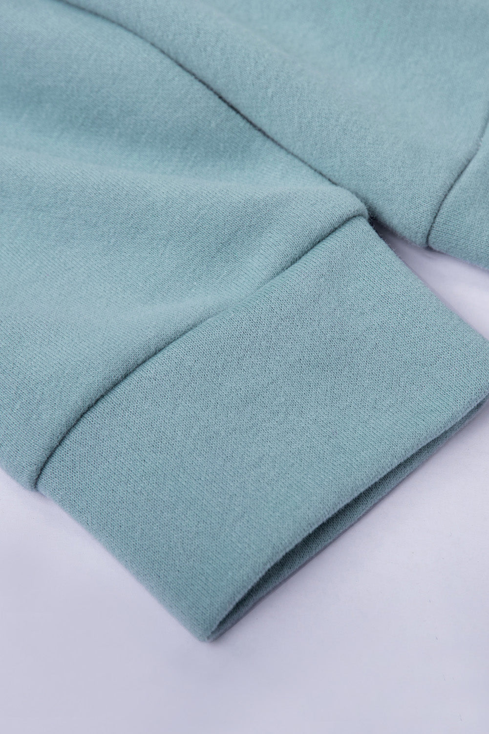 Sweat à capuche à manches longues et demi-fermeture éclair avec poche 