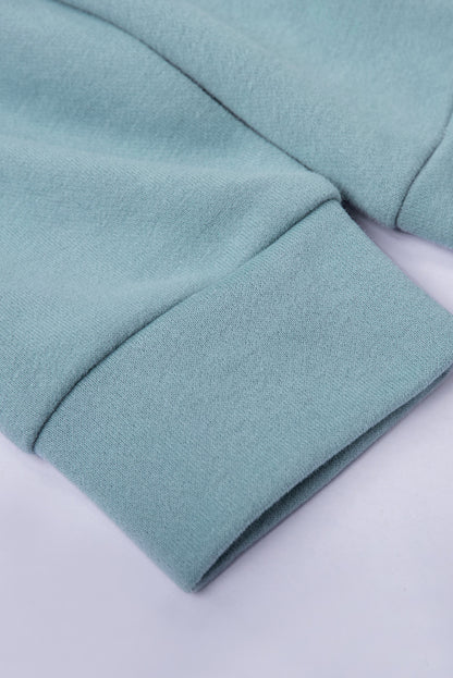 Sweat à capuche à manches longues et demi-fermeture éclair avec poche 