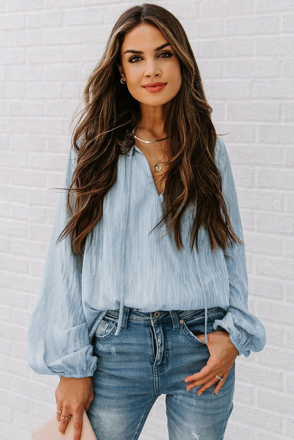 Haut uni texturé à col en V et manches lanternes 